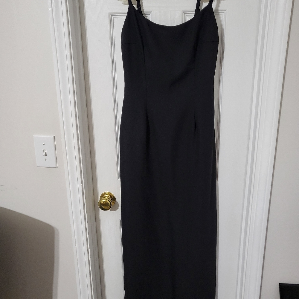 Long black dress with jacket.